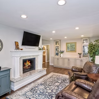 Coastal fireplace wall after Snyder Atelier remodel